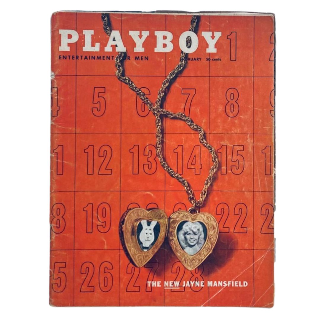 VTG Playboy Magazine February 1957 featuring Jane Mansfield on the cover, showcasing a vintage aesthetic with a bold red background and heart-shaped locket design.