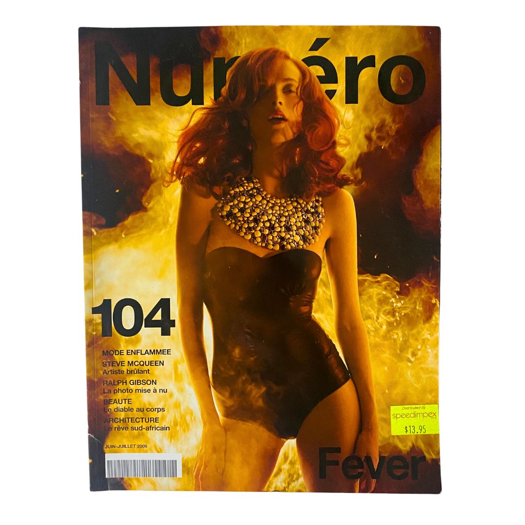 Numéro Magazine June 2009 No. 104 featuring model Karen Elson on the cover, highlighted by a fiery background and dramatic styling, making it a striking collectible.