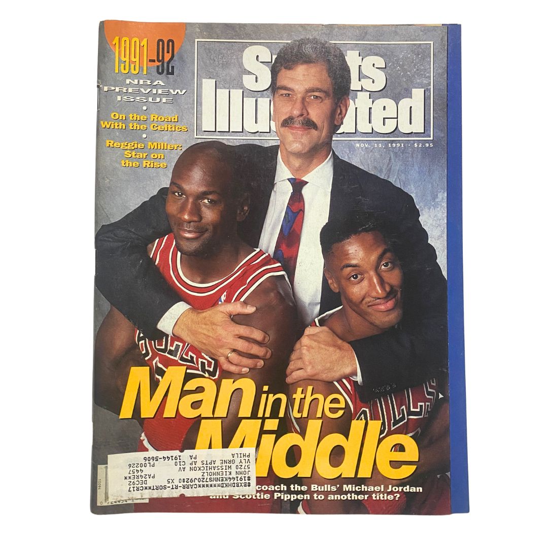Sports Illustrated Magazine cover from November 11, 1991, featuring NBA stars Michael Jordan and Scottie Pippen alongside coach Phil Jackson, highlighting the theme 'Man in the Middle' for the 1991-92 NBA season.