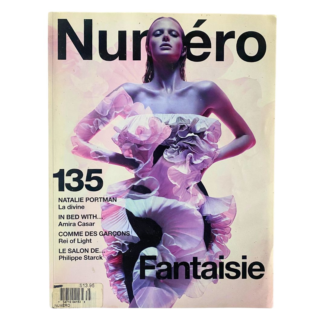 Numéro Magazine August 2012 cover featuring model Anne Vyalitsyna in an artistic photoshoot that embodies elegance and style.