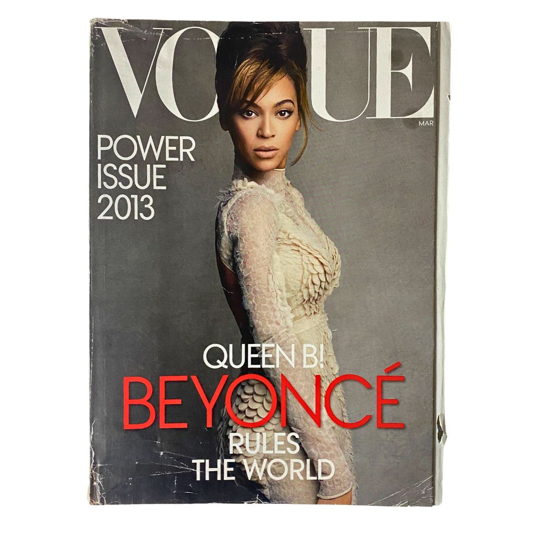 Vogue Magazine March 2013 Beyonce Power Issue cover featuring Beyonce with the text 'Queen B: Beyonce Rules the World'.