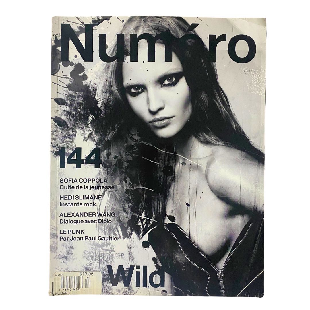 Cover of Numéro Magazine June 2013 No. 144 featuring Sasha Luss, showcasing high-fashion style and photography.