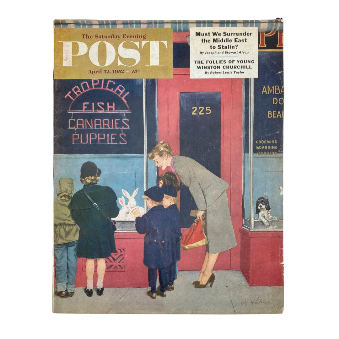 Cover image of the Saturday Evening Post Magazine April 22, 1952 featuring a mother and children gazing at a pet store window showcasing rabbits and puppies.
