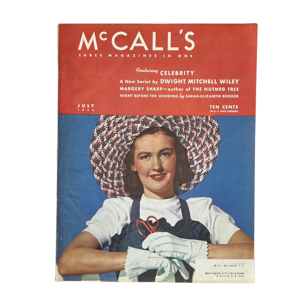 Cover of VTG McCall's Magazine July 1939 featuring the title "The Nutmeg Tree" by Margery Sharp, showcasing a woman in a large straw hat and gloves.