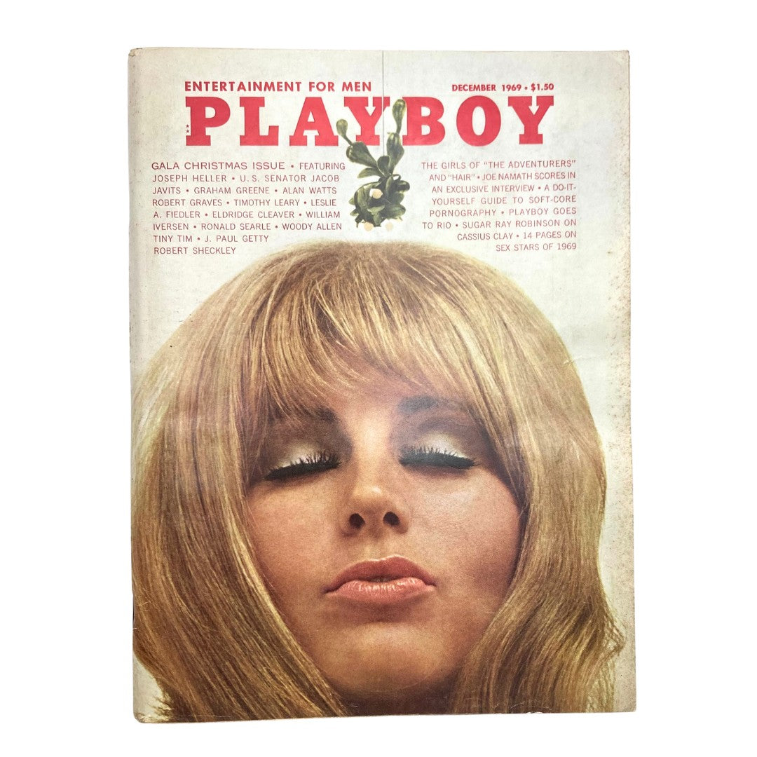 Vintage Playboy Magazine December 1969 cover featuring iconic model Gloria Root in a glamour pose.