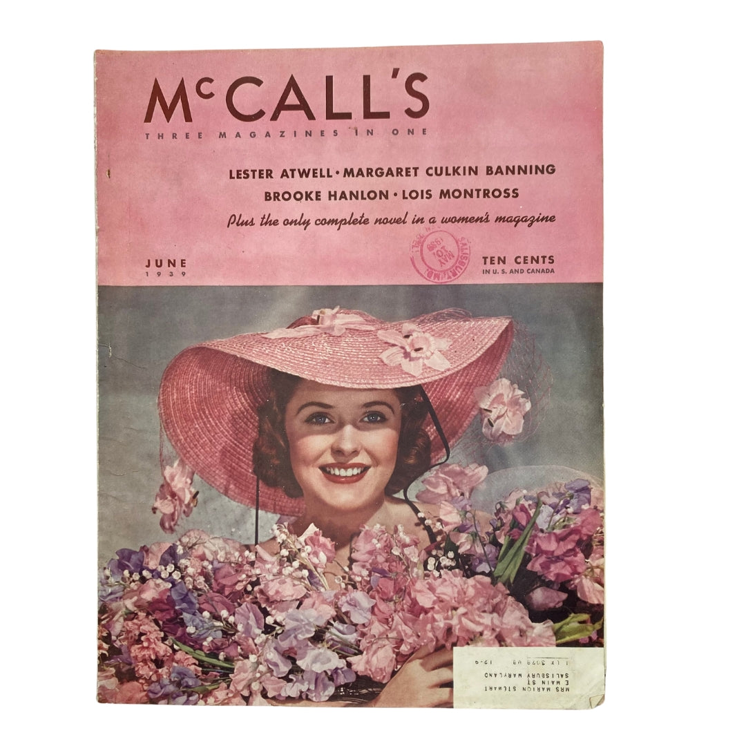 Cover of VTG McCall's Magazine June 1939 titled 'The Luck of Some Women' by Margaret Culkin Banning featuring a woman in a pink hat surrounded by flowers.