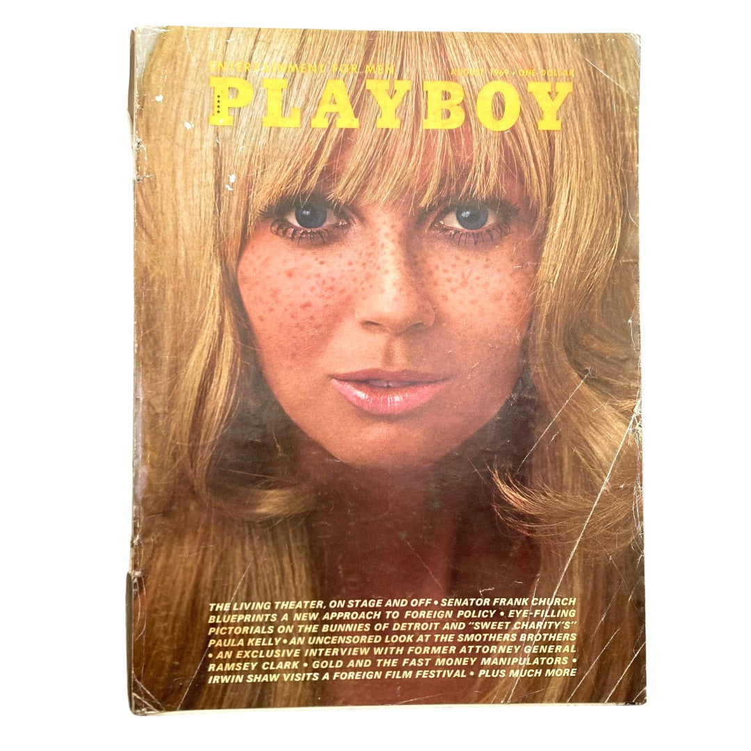 Vintage Playboy Magazine August 1969 cover featuring Playmate Debbie Hooper with a stunning portrait and iconic hairstyle. A true collector's item from the 1960s.