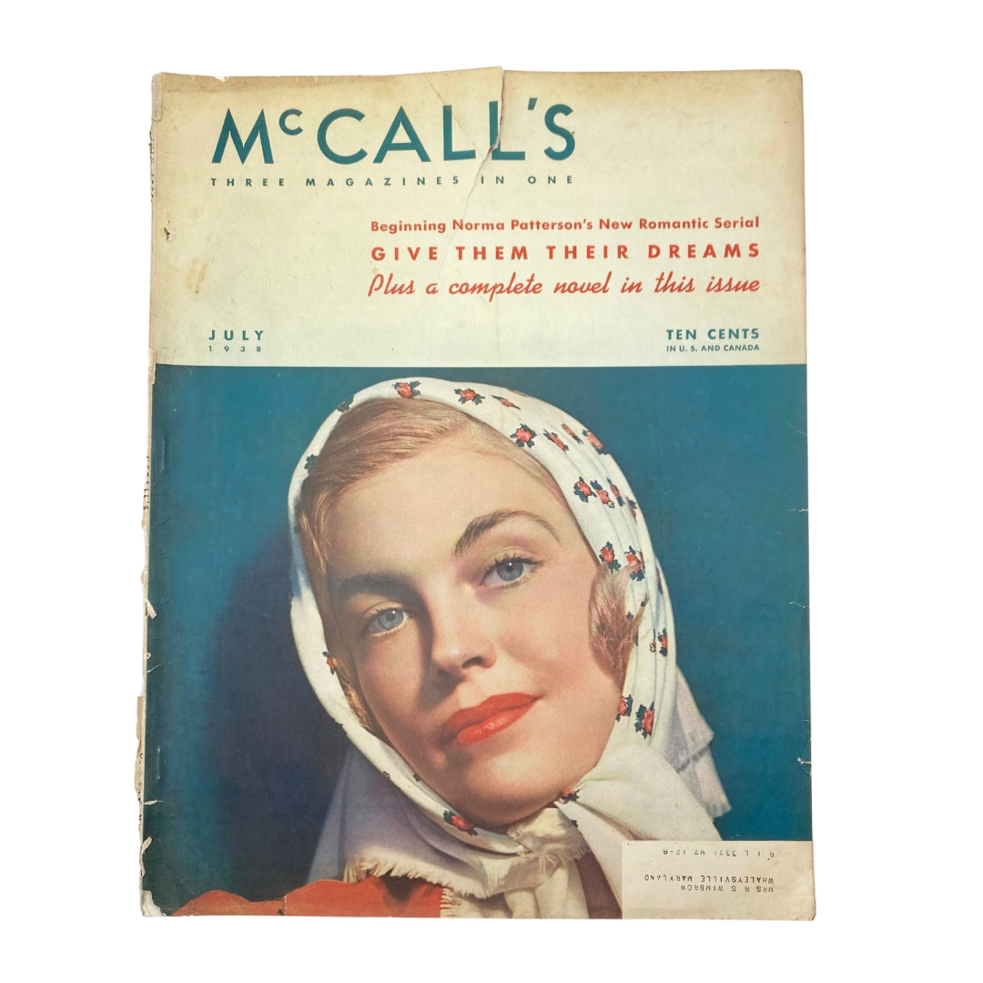 Cover of the vintage McCall's Magazine from July 1938, featuring the article 'Give Them Their Dreams' by Norma Patterson, showcasing a woman with a headscarf and vibrant colors, ideal for collectors and vintage enthusiasts.