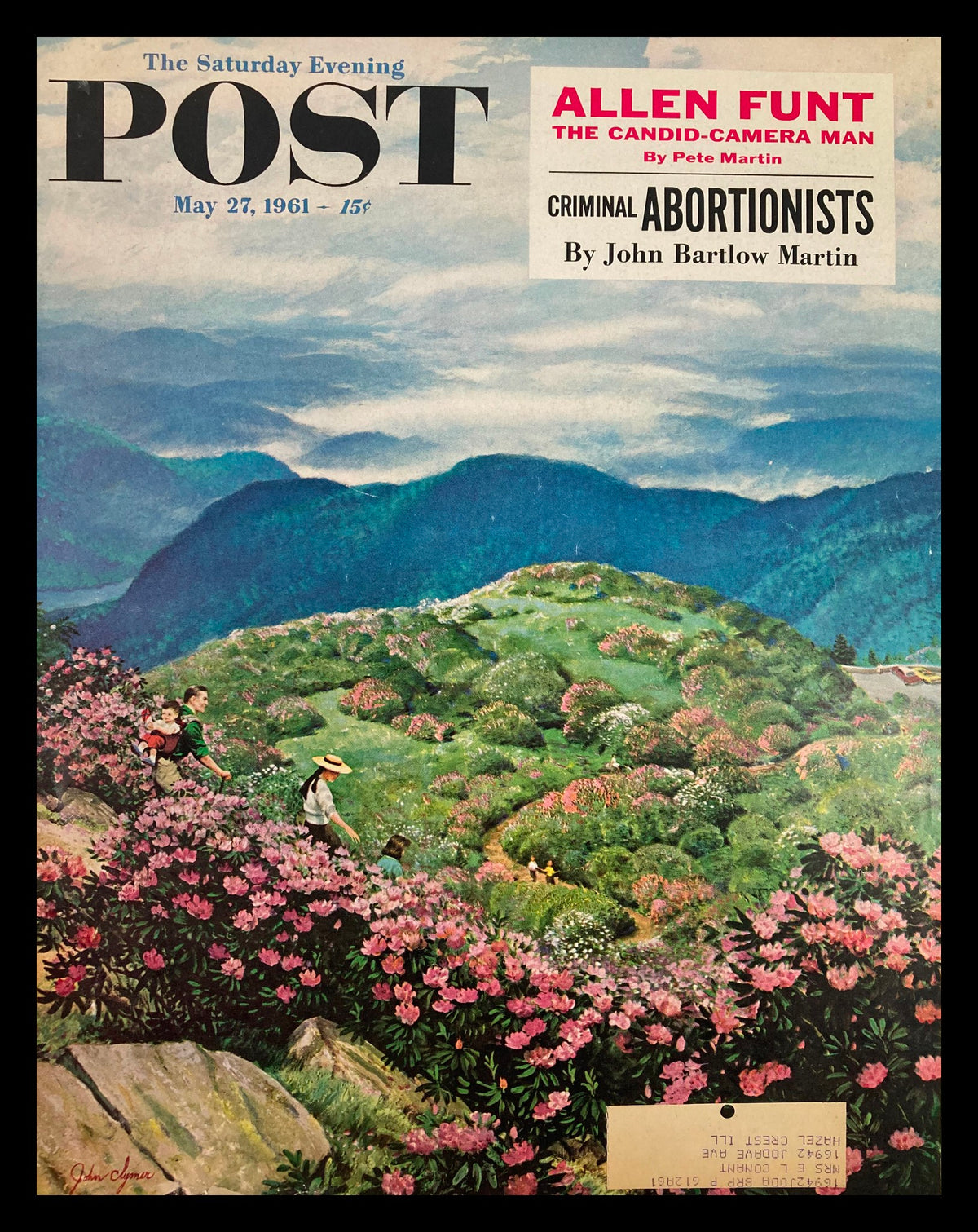 Cover of The Saturday Evening Post dated May 27, 1961 featuring Allen Funt, the Candid-Camera Man, surrounded by vibrant floral scenery and hiking figures.