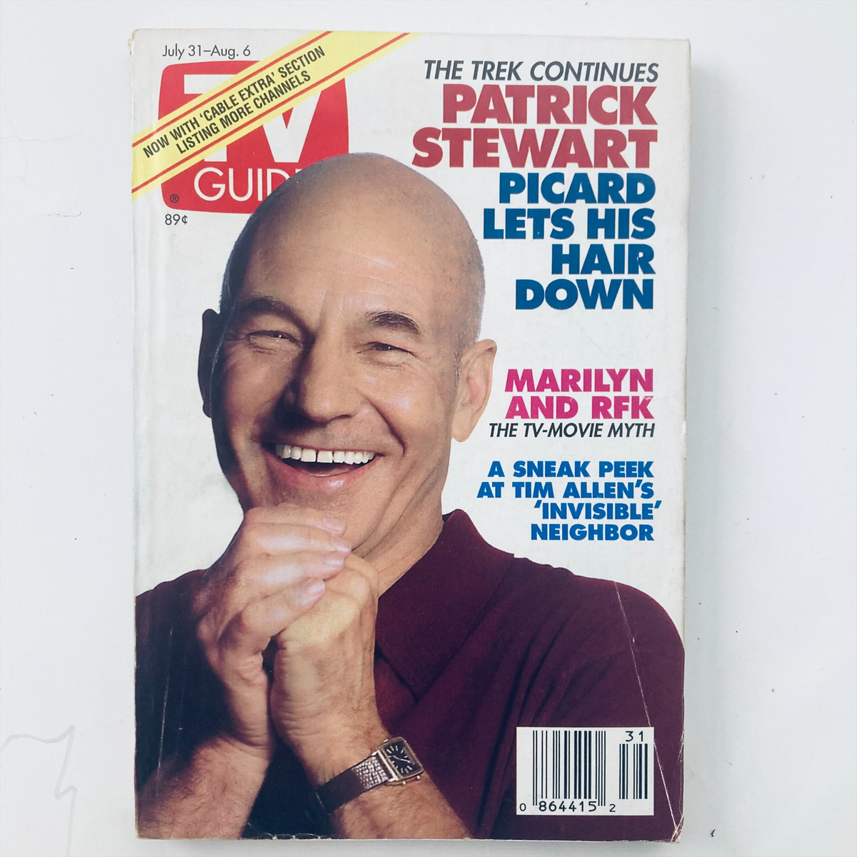 TV Guide Magazine July 31 1993 featuring Patrick Stewart on the cover, showcasing a smiling Stewart in a maroon shirt, with the headline 'The Trek Continues: Patrick Stewart - Picard Lets His Hair Down', offering a nostalgic glimpse into television history.