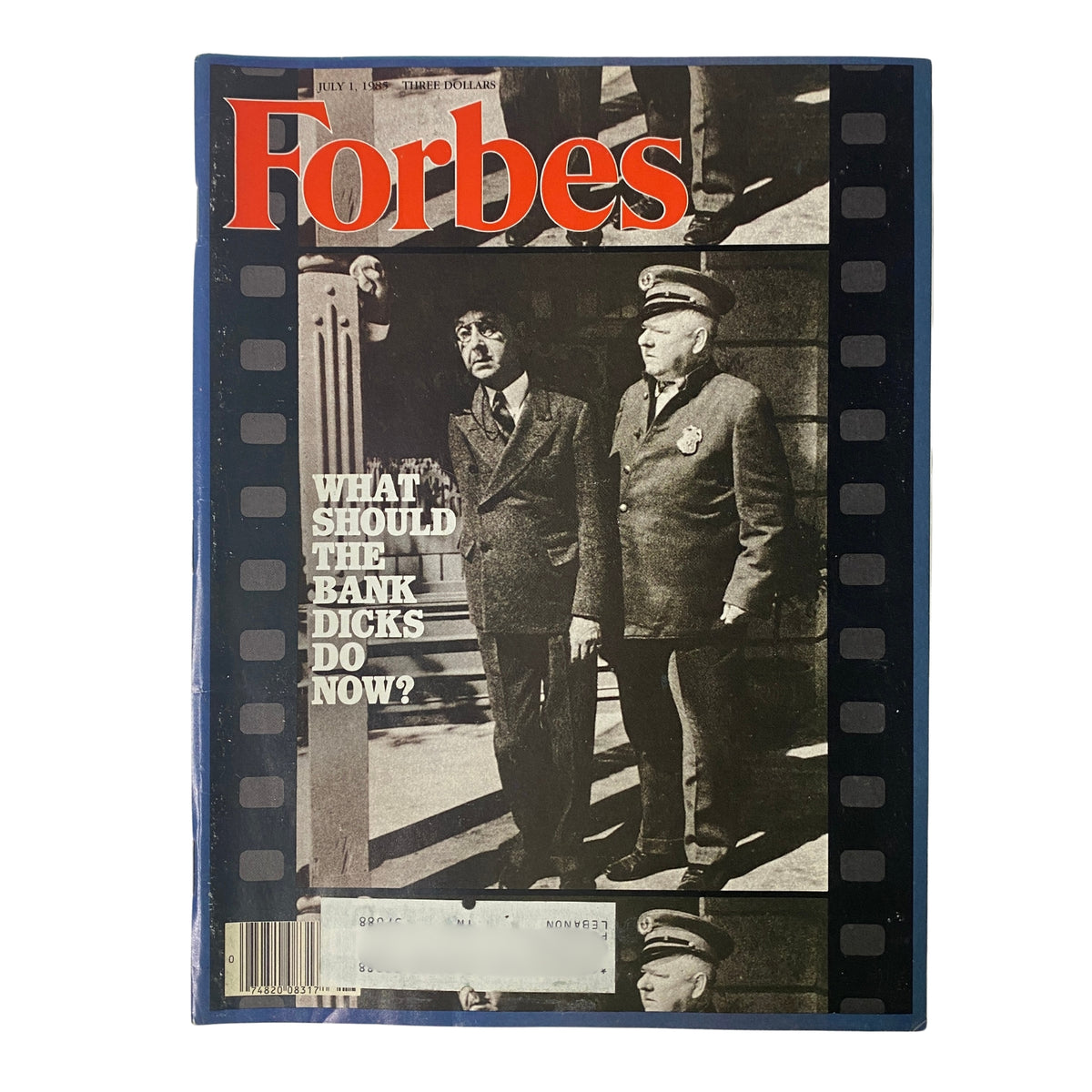 Cover of Forbes Magazine, July 1, 1985, featuring the title 'What Should The Bank Dicks Do Now?', showcasing two men in suits discussing banking challenges.