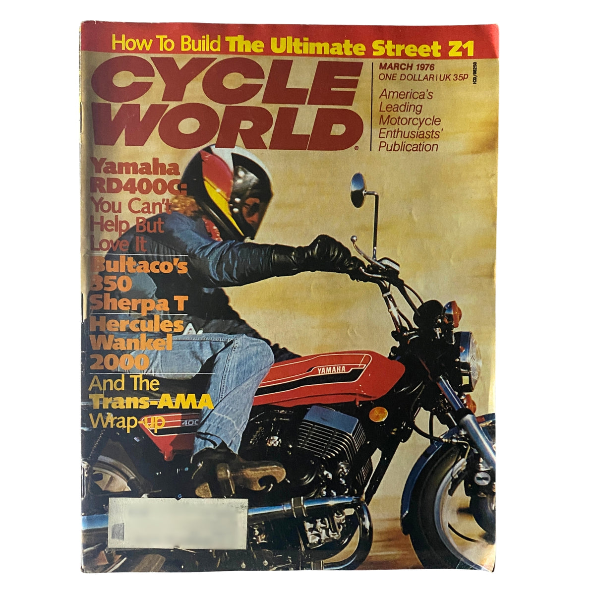 Cycle World Magazine March 1976 cover featuring Fernando Belair riding the Yamaha RD400C, showcasing vintage motorcycle culture.