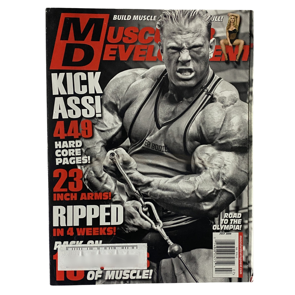 Cover of Muscular Development Magazine July 2009 Vol 46, Num 7 featuring Dennis Wolf, showcasing bodybuilder with 23 inch arms and featured topics on hardcore training and bodybuilding.