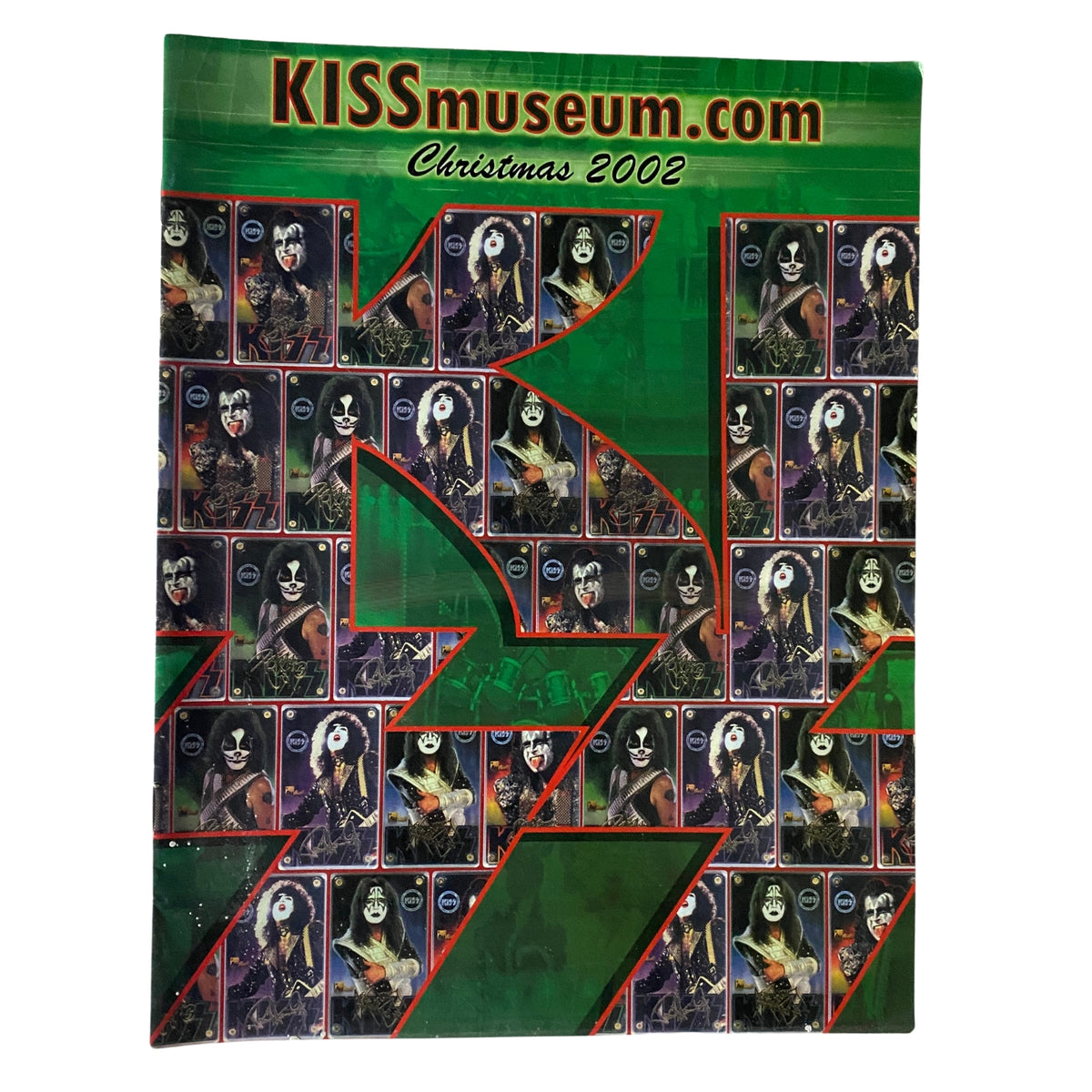 KISS Museum.com Catalog Christmas 2002 cover featuring iconic KISS band members and vibrant merchandise design.