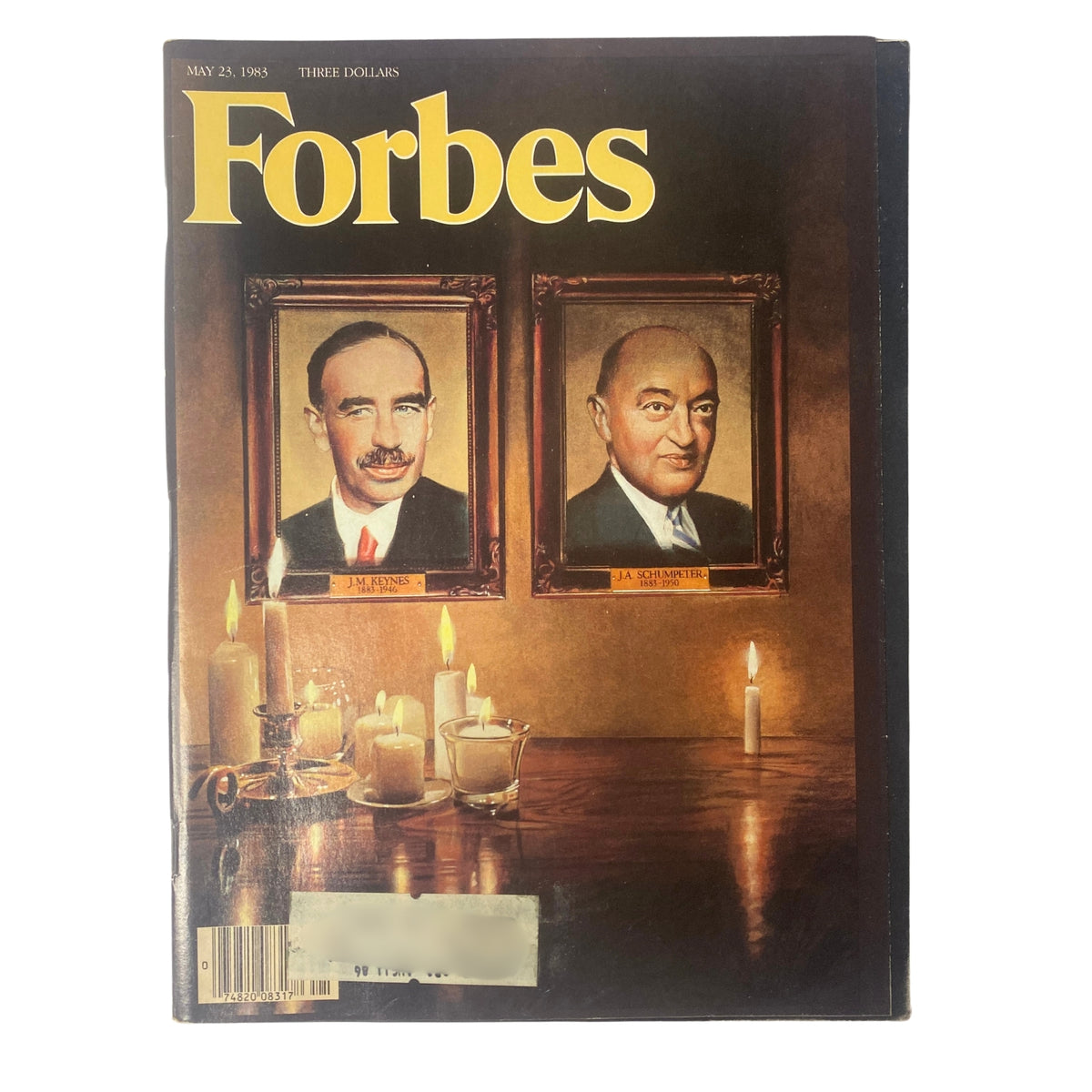Cover of Forbes Magazine dated May 23, 1983, featuring portraits of J.M. Keynes and J.A. Schumpeter with candles and a wooden table decoration.