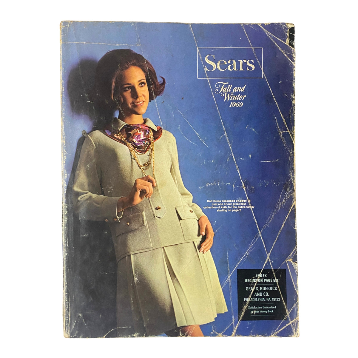 Cover of the 1969 Sears Fall and Winter Catalog featuring a stylish model showcasing vintage fashion with a sophisticated outfit.