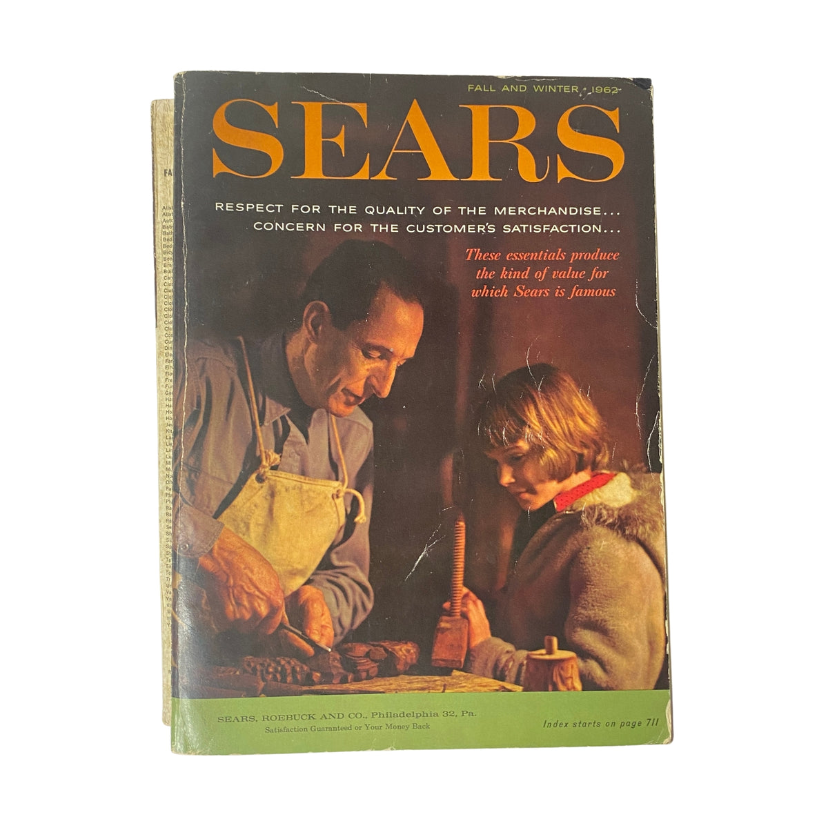 Cover of the 1962 Sears Fall and Winter Catalog showcasing a father and child, highlighting vintage Americana and mid-century design.