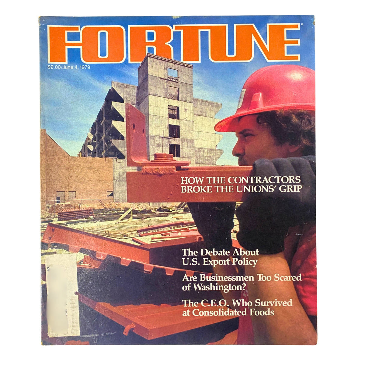 Cover of Fortune Magazine June 4, 1979 featuring the title 'How The Contractors Broke The Unions' Grip' with an image of a construction worker wearing a hard hat on a construction site, amidst buildings under construction.