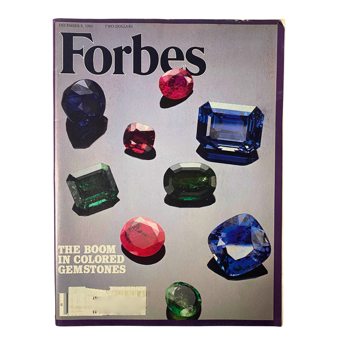 Forbes Magazine cover from December 8, 1980, featuring the article 'The Boom in Colored Gem Stones' with various colorful gemstones displayed prominently.