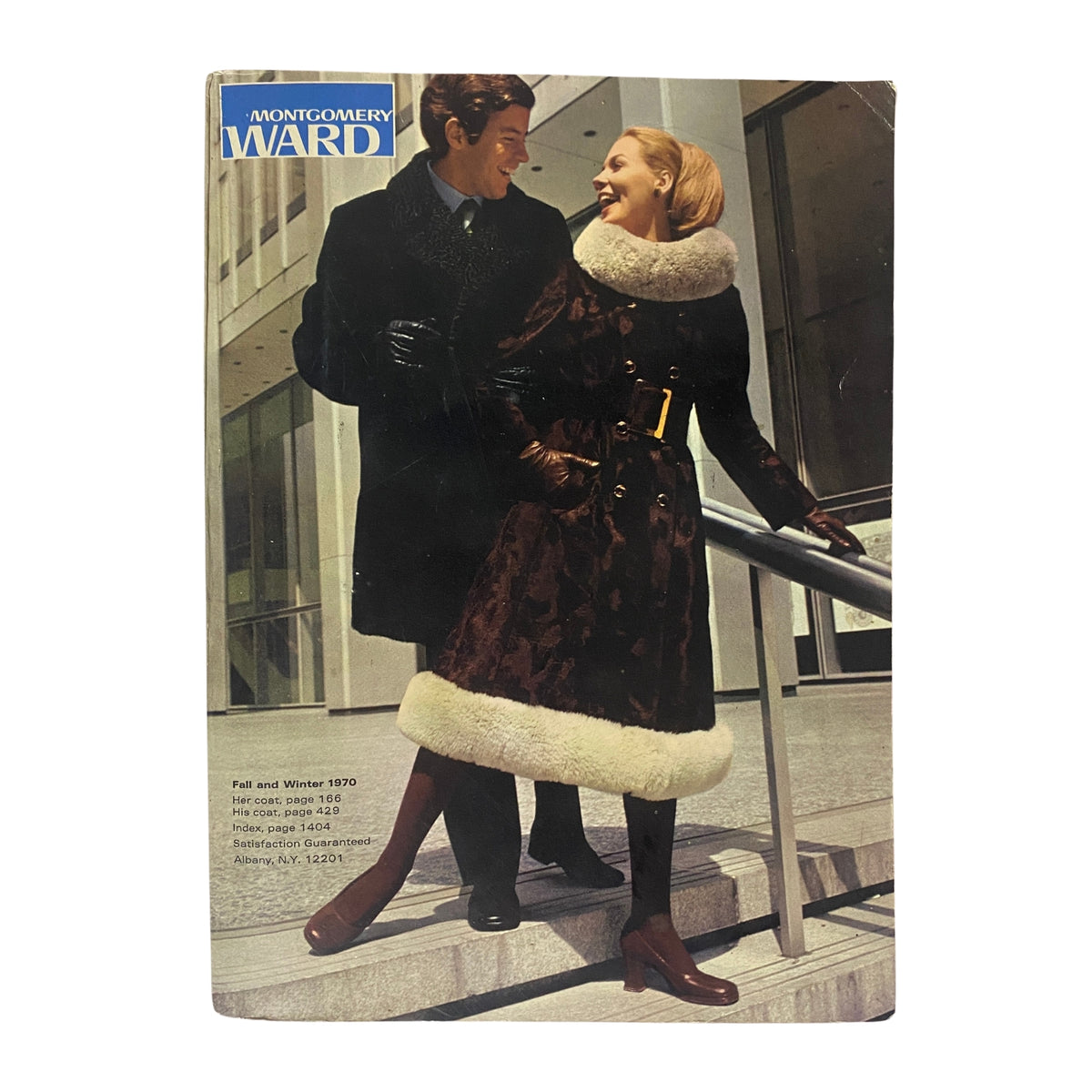 Cover of the 1970 Montgomery Ward Fall and Winter Catalog featuring a man and woman dressed in stylish winter attire with a coat featuring a fur collar.
