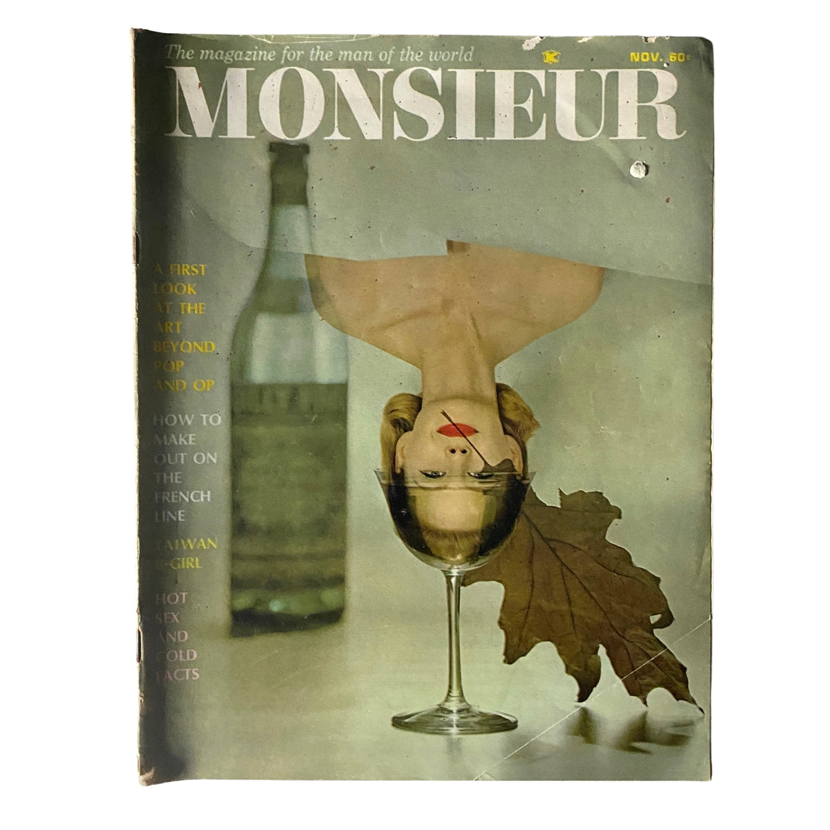 Cover of Monsieur Magazine November 1965 showcasing the theme 'New Ways in Photography' with an intriguing upside-down image of a woman in a glass and a wine bottle in the background.