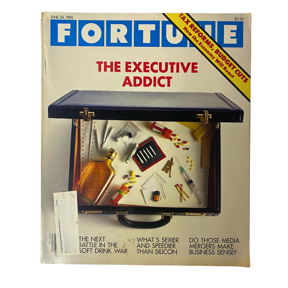 Fortune Magazine June 24, 1985 cover featuring the title 'The Executive Addict' with an image of a briefcase filled with substances and business-related items.