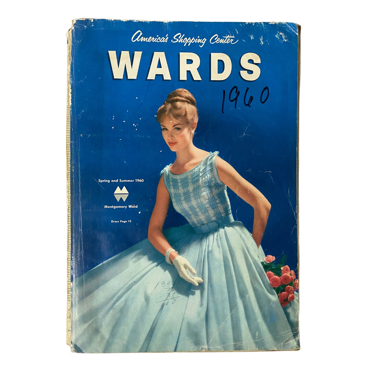 Cover of 1960 Montgomery Ward Spring and Summer Catalog featuring a fashionable woman in a blue dress with elegant gloves.