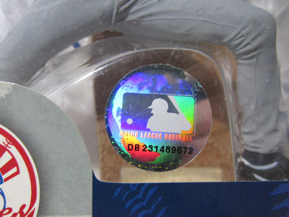 Close-up of the holographic MLB logo sticker on the Mcfarlane MLB Series 9 Figure: Mariano Rivera, verifying authenticity.