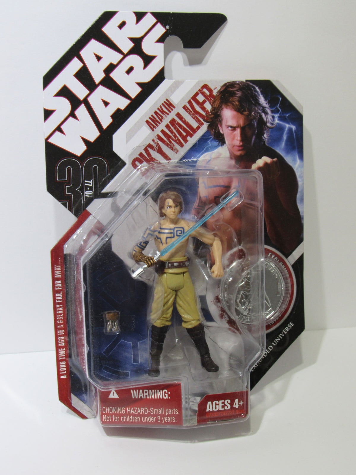 Star Wars Anakin Skywalker Clone Wars with Tattoos 30th Anniversary collectible action figure in original packaging, featuring detailed design and included commemorative coin.