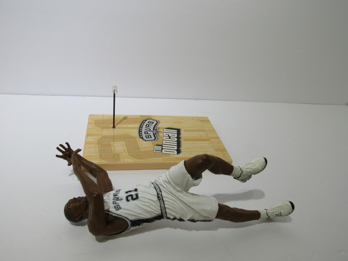 McFarlane NBA Series 6 Loose Figure: Tim Duncan shown in a dynamic pose on hardwood-style base.