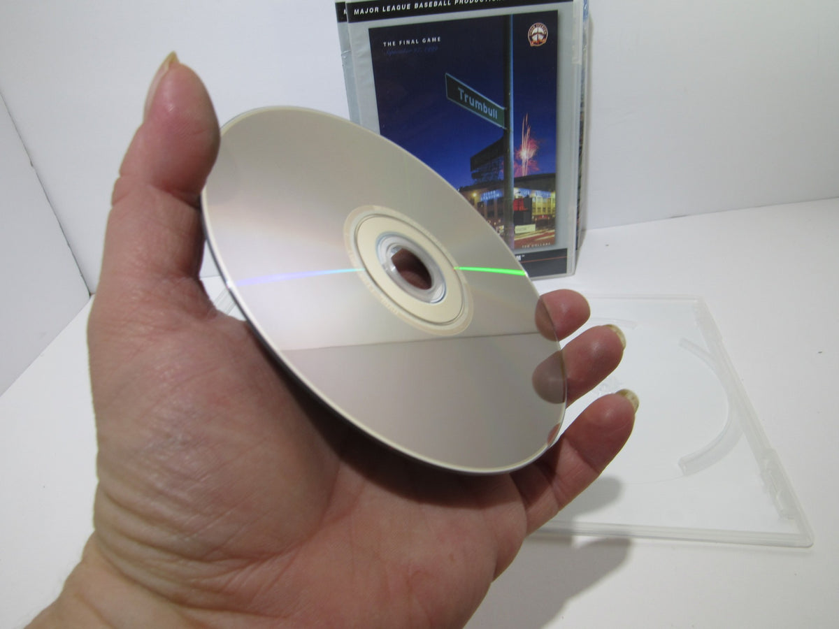 Essential Games Of The Detroit Tigers (2010) DVD showing a close-up of the DVD disc held in hand, emphasizing its excellent condition.
