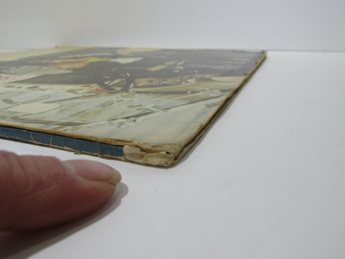 Side view of the Donna Summer: Greatest Hits on the Radio LP cover, highlighting edges and corners showing signs of wear.