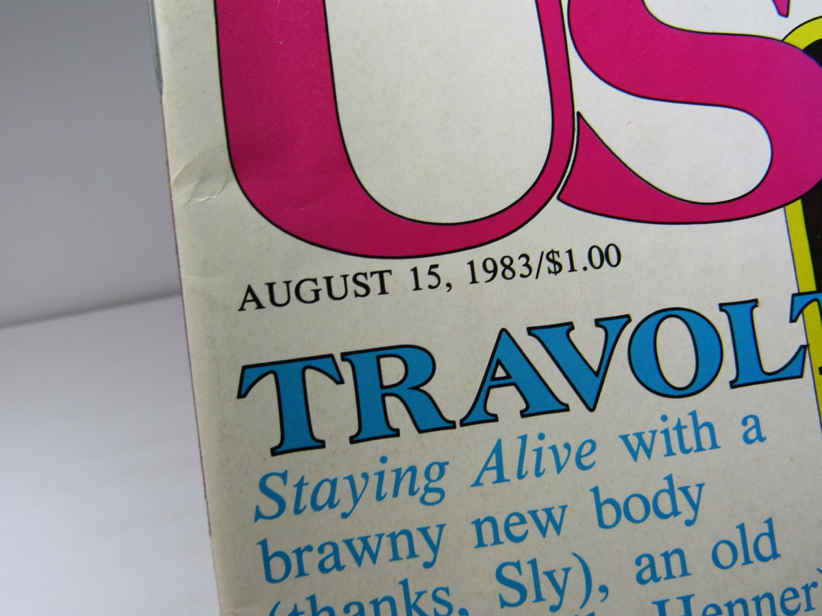 Close-up view of the header from the Vintage US Magazine August 15, 1983 cover, highlighting John Travolta and mentions of articles inside.