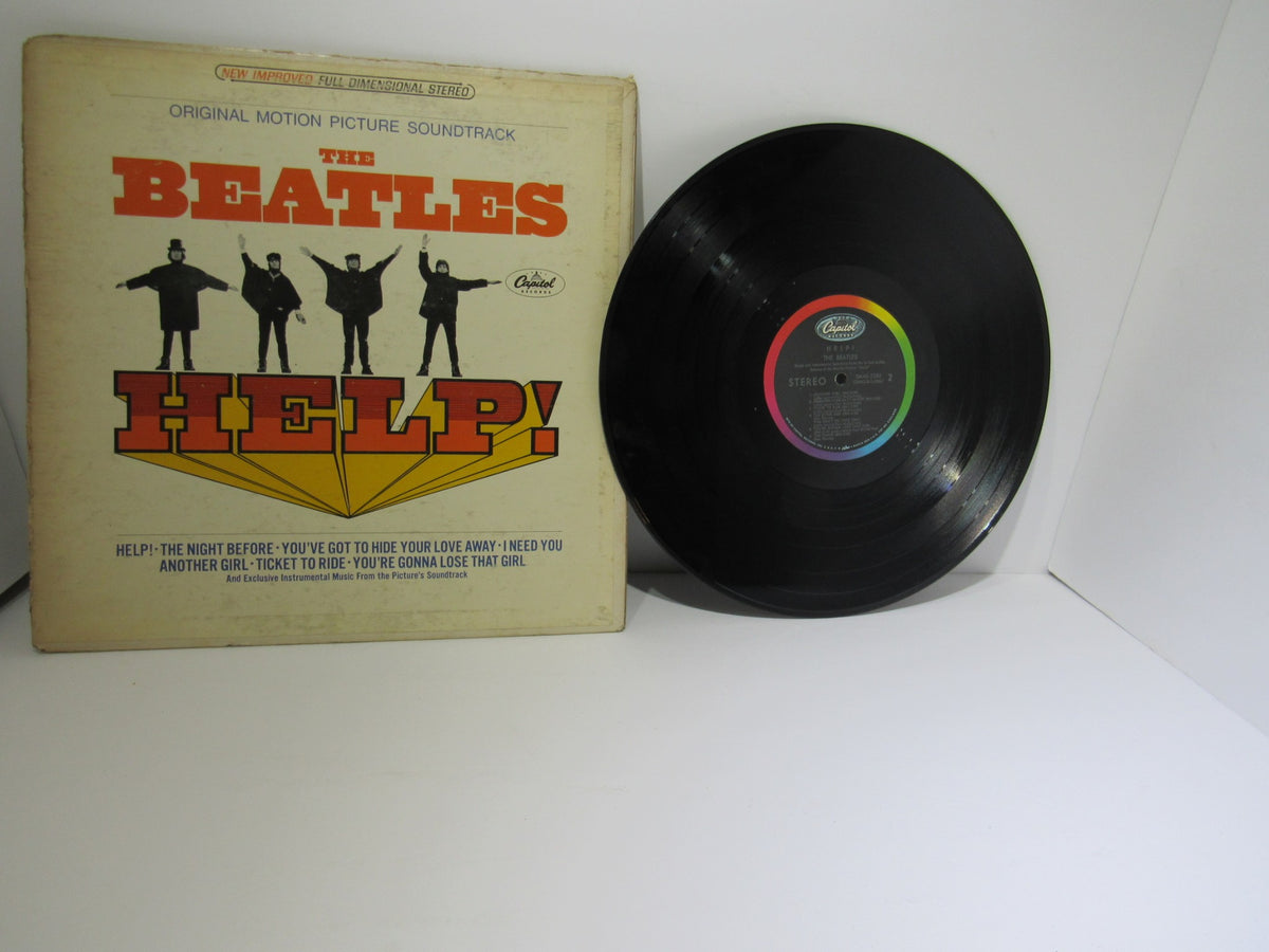 The Beatles Help! OMPS/OST Capitol Gatefold Stereo LP SMAS 2386 showcasing the album cover with iconic band members standing in front.