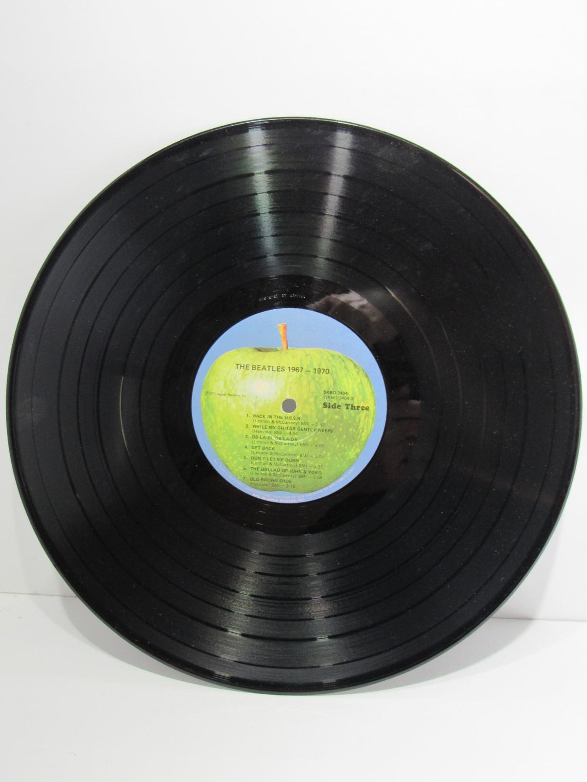 The Beatles 1967-1970 Gatefold Sleeve Vinyl Record - Side Three featuring tracklist.