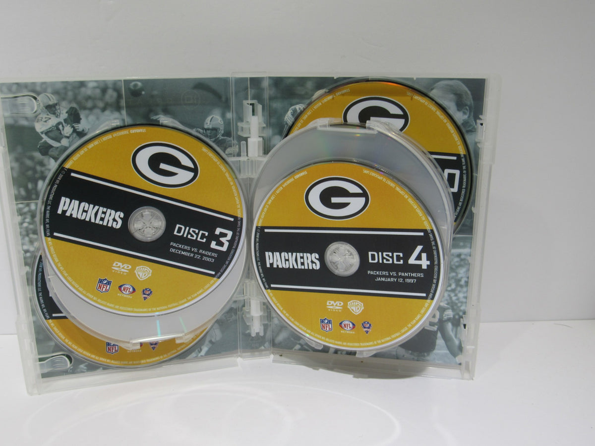 Inside view of NFL Greatest Games Series: Green Bay Packers Greatest Games DVD case showing discs 3 and 4.