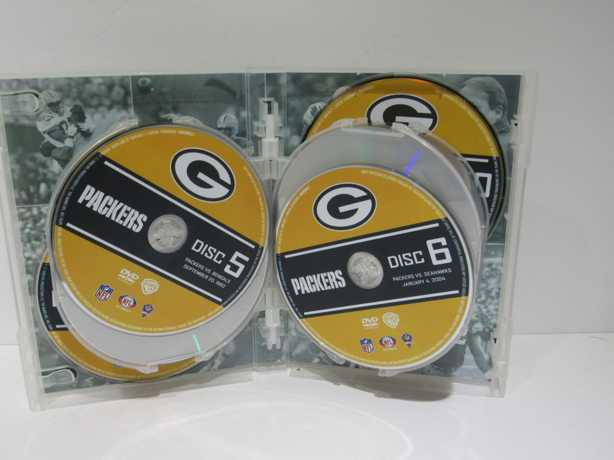 Inside view of NFL Greatest Games Series: Green Bay Packers Greatest Games DVD case showing discs 5 and 6.