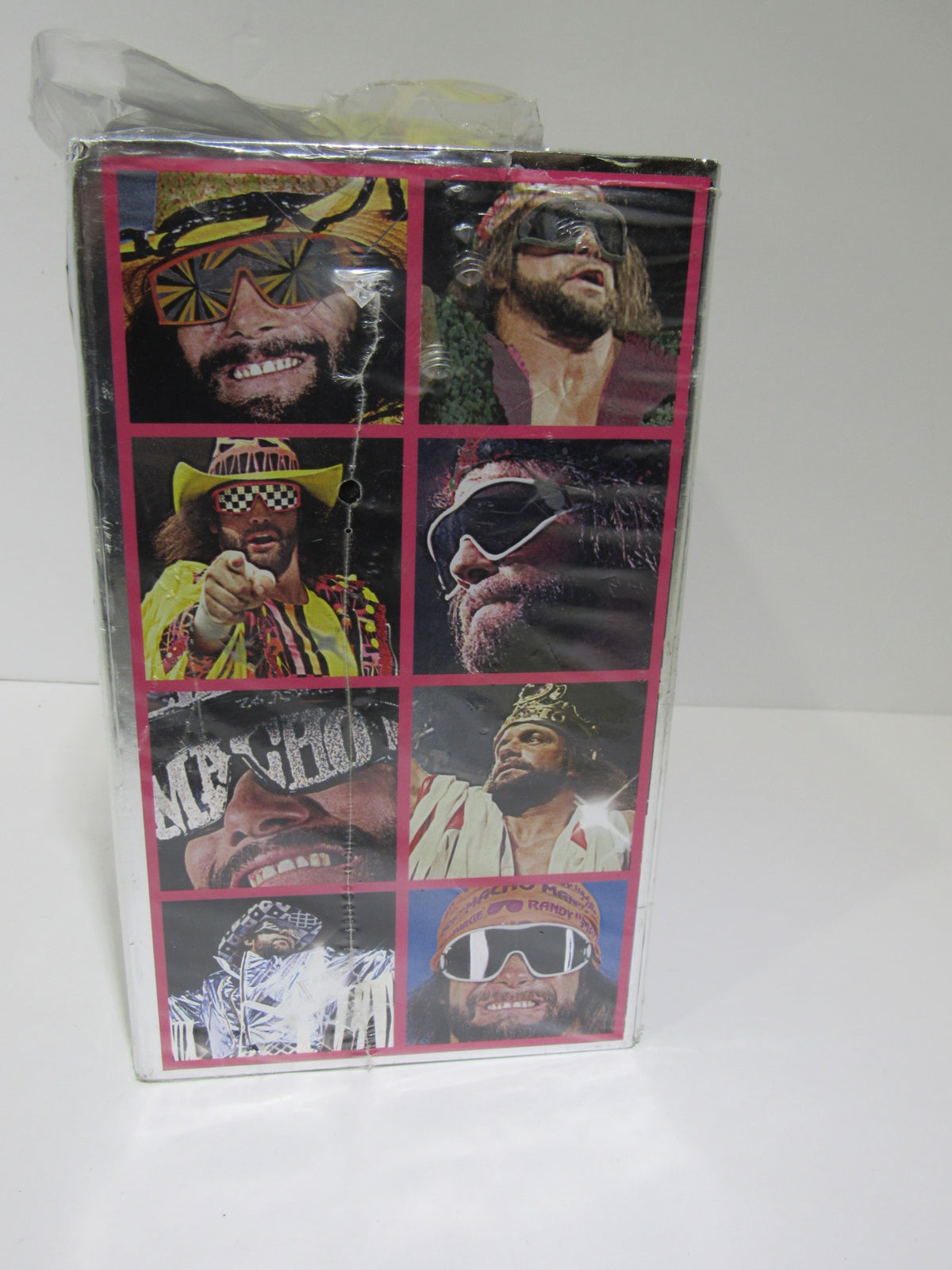 Side view of the Macho Man: The Randy Savage Story Collector's Edition DVD, displaying various images of Randy Savage in vibrant costumes and poses.