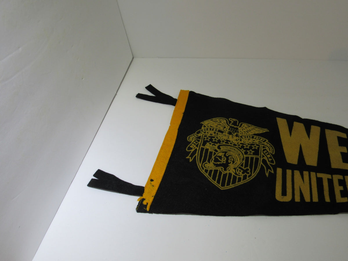 Vintage West Point United States Military Pennant Banner displaying the emblem of the United States Military and the text 'WEST UNITED STATES' in bold yellow against a black background, with frayed edges.