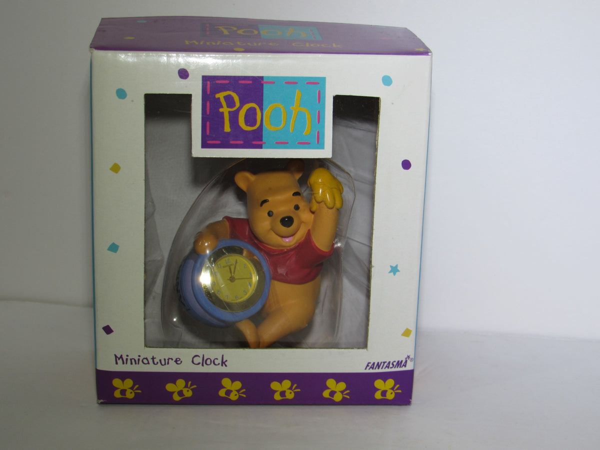 Fantasma Walt Disney Winnie The Pooh Miniature Desk Office Clock in original packaging, featuring Pooh holding a clock, perfect for Disney collectors.