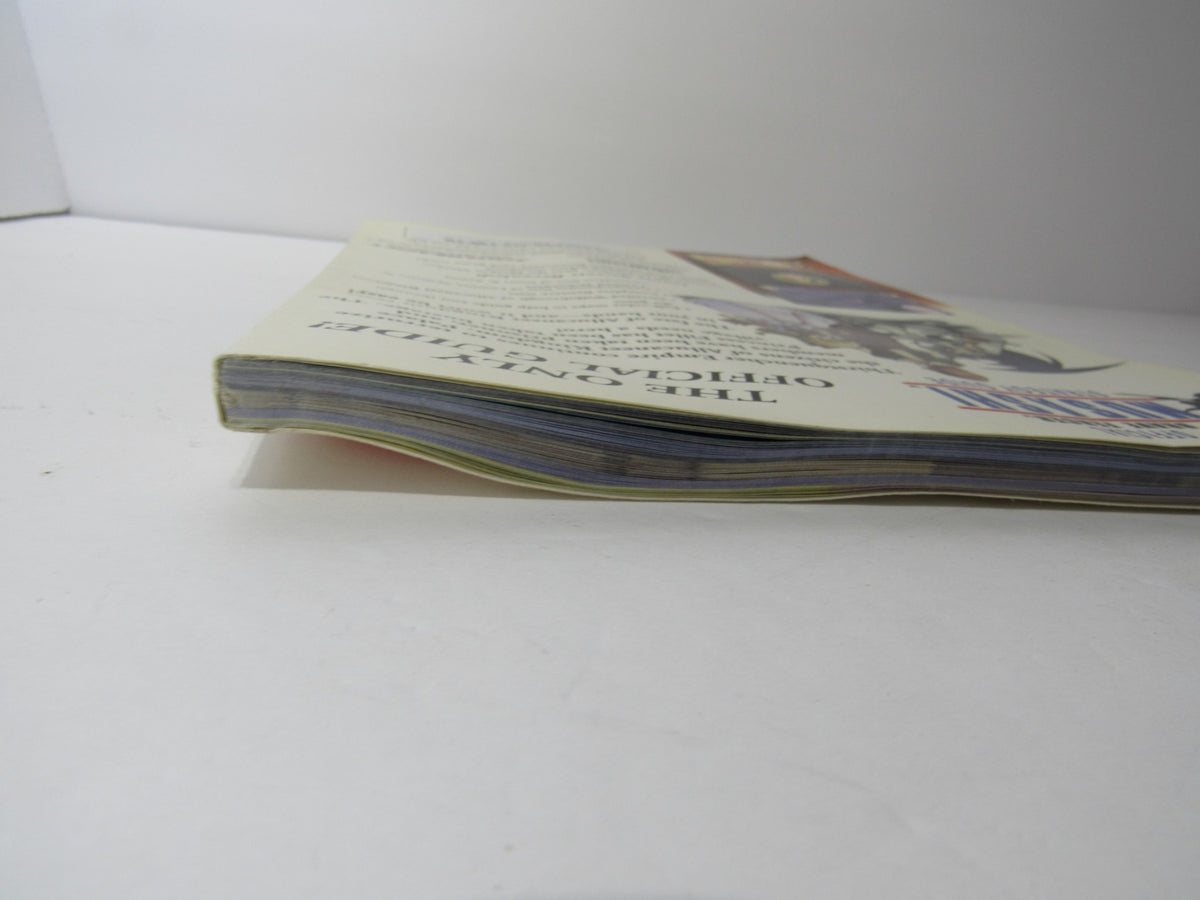 Another side view of the Brady Games Squaresoft Official Brave Fencer Musashi Strategy Game Guide highlighting its thickness and condition.