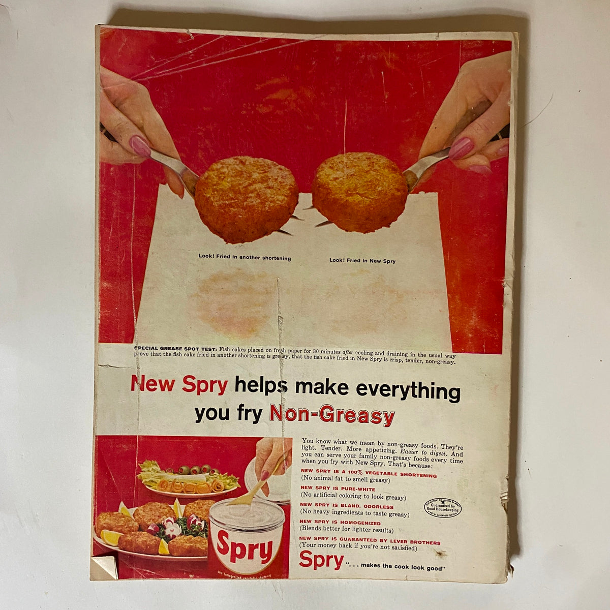 Back cover of the VTG Good Housekeeping Magazine May 1957 highlighting an advertisement for New Spry cooking oil, demonstrating mid-century marketing style.