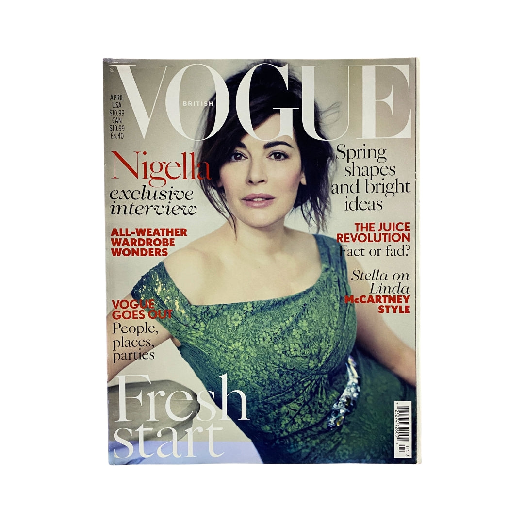 Vogue UK Magazine April 2014 cover featuring Nigella Lawson, showcasing her in a stunning green dress, symbolizing a fresh start in fashion.
