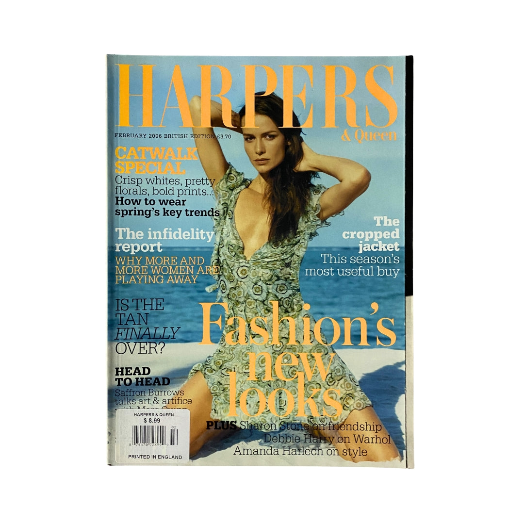 Harpers & Queen Magazine February 2006 featuring Saffron Burrows on the cover, showcasing fashion trends and celebrity culture.