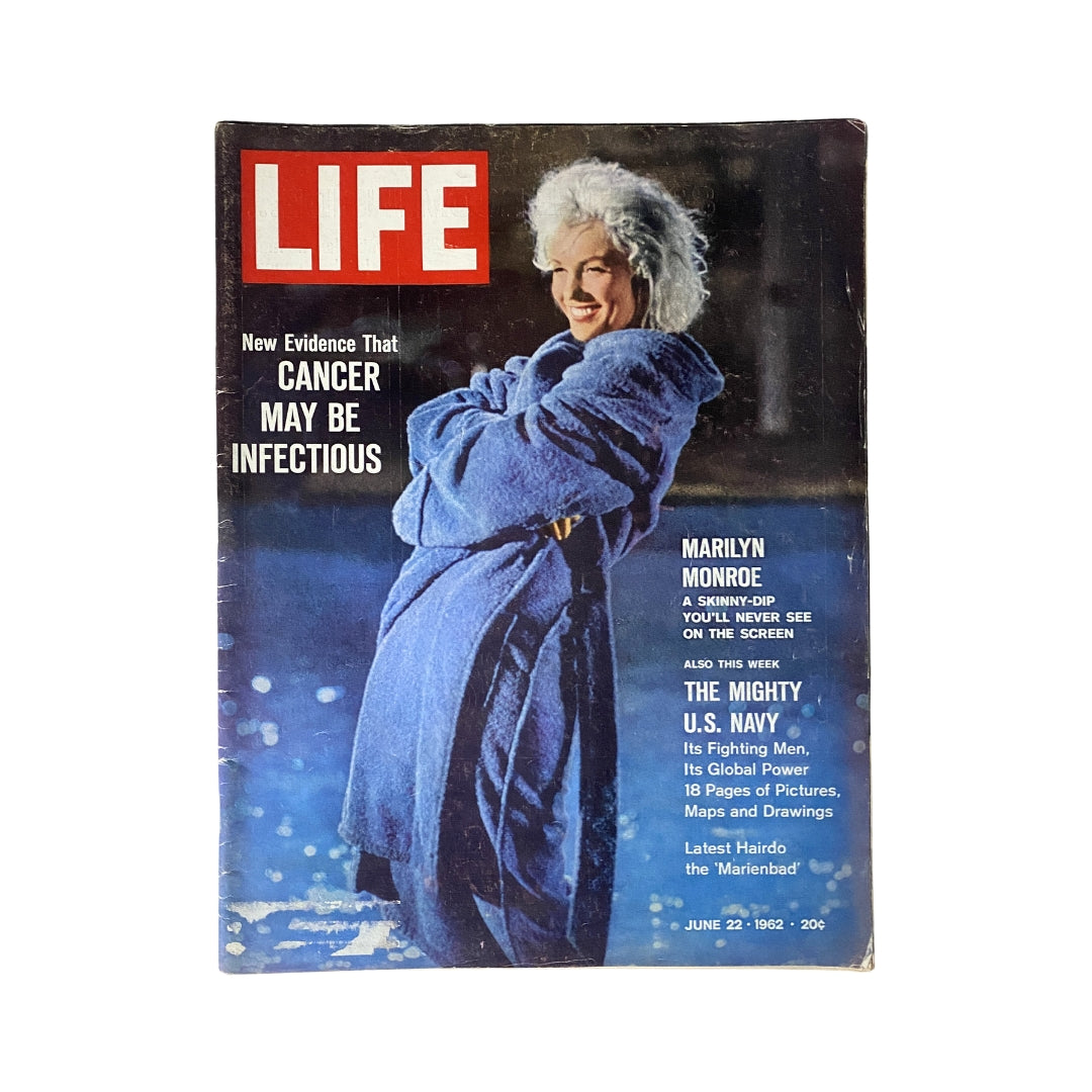 Vintage LIFE Magazine Cover featuring Marilyn Monroe from June 22, 1962, highlighting cancer research. The cover presents Monroe in a blue robe with the text 'Cancer May Be Infectious' and details about articles within.
