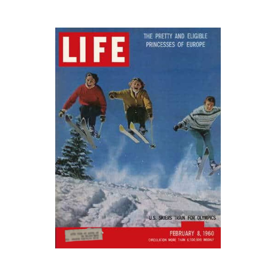 Cover of Life Magazine from February 8, 1960, featuring U.S. skiers training for the Olympics, showcasing three skiers in mid-air on snow-covered slopes.