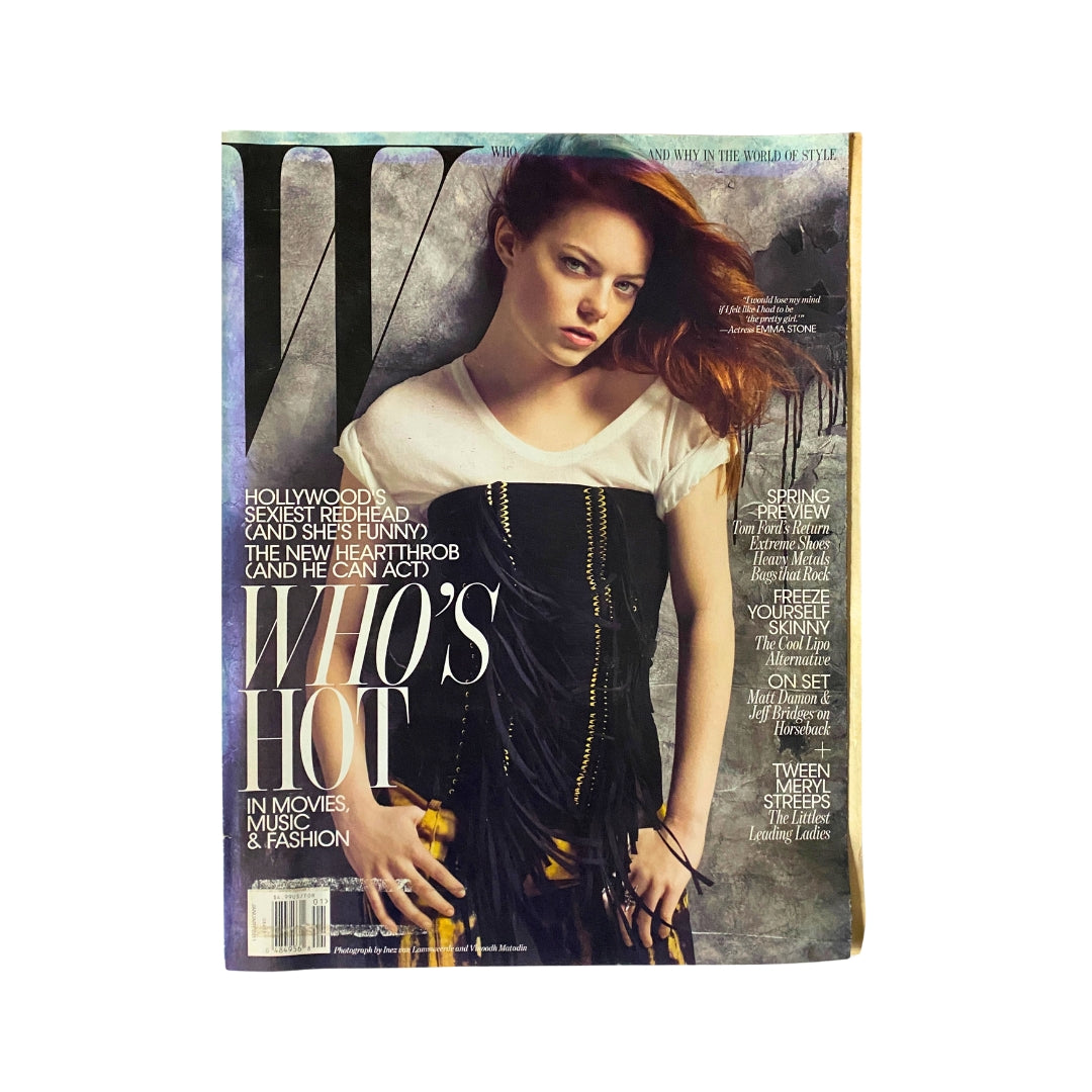 W Magazine January 2011 cover featuring actress Emma Stone, showcasing her stylish look and striking pose, representing a significant moment in her early career.