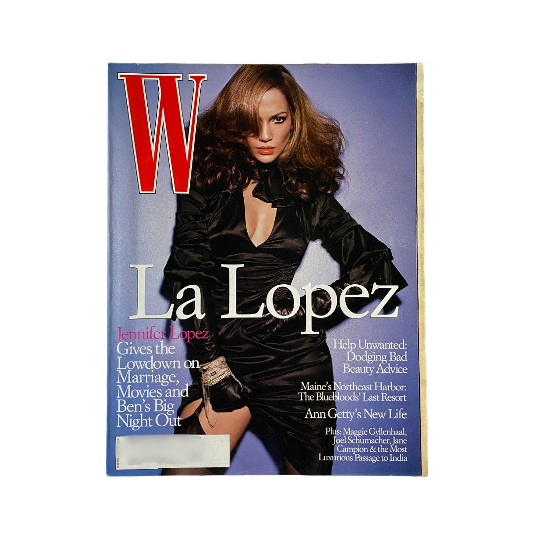 W Magazine October 2003 cover featuring Jennifer Lopez in a chic black outfit, titled 'La Lopez', discussing marriage, movies, and more.