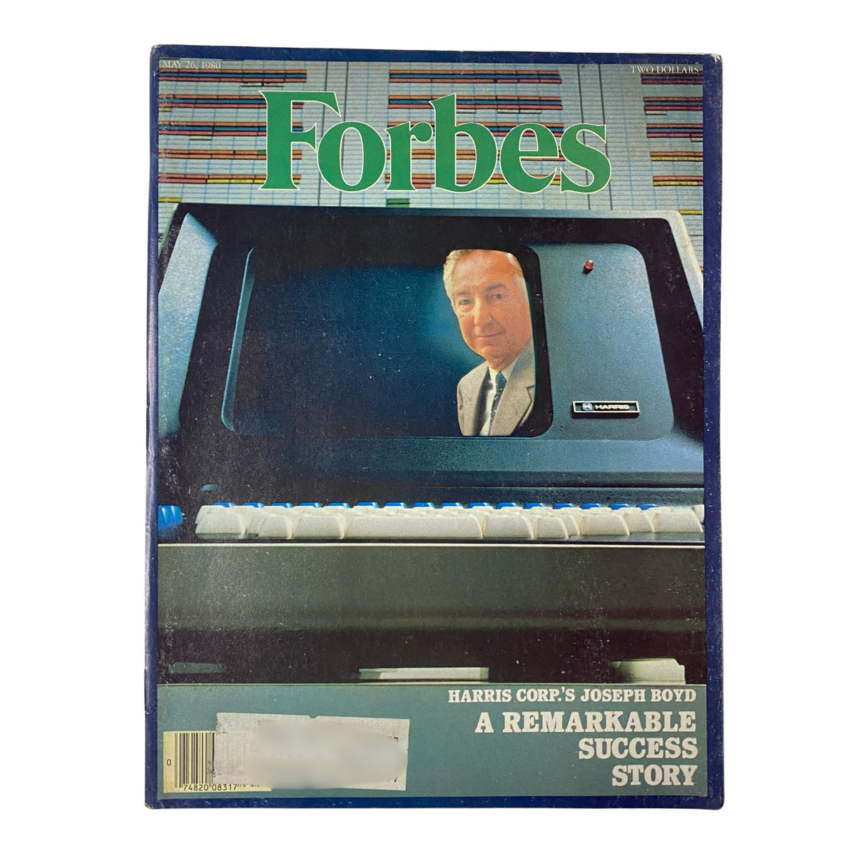 Cover of Forbes Magazine from May 26, 1980 featuring the title 'Harris Corp.'s Joseph Boyd, A Remarkable Success Story', showcasing a vintage design with a focus on technology and business success.