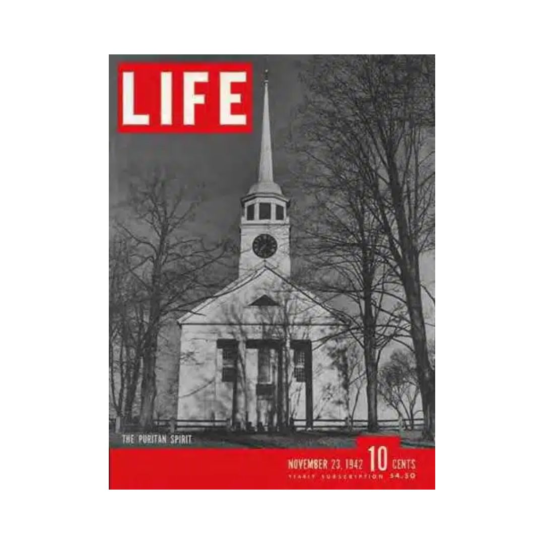 VTG Life Magazine November 23, 1942 featuring the cover titled 'The Puritan Spirit', showcasing a historic church with a clock, surrounded by trees.